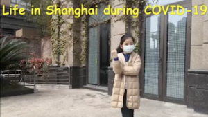 Image: girl with face mask in Shanghai