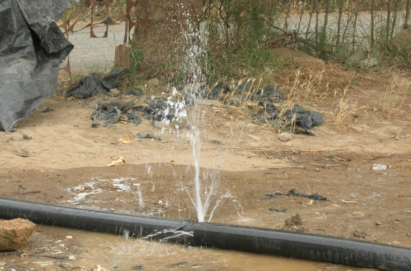 Photo: Groundwater Pipe with a leak, water fountain