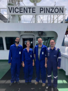 Photo: From left to right: Carlos Musetti (GEOMAR), Ramona Hägele (IDOS), Tobias Steinhoff (GEOMAR), Captain José Salgado (Aliança) on board of Vicente Pinzon. (Picture: Julio Adorno, Aliança)