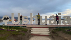 Photo: The research team between the letters "Ushuaia"