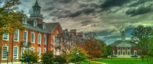 Photo of the Johns Hopkins University in Baltimore with dark clouds in heaven.