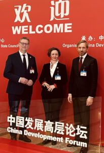 Anna-Katharina Honridge with 2 colleagues at the China Development Forum