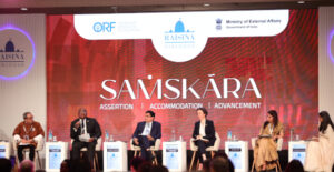 Photo: Panelists sitting on stage at the Raisina Dialogue 2026, including IDOS director Anna-Katharina Hornidge