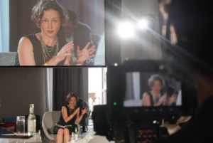 Photo: Prof. Anna-Katharina Hornidge at the Accelerator event, visible in full as well as on a camera screen.